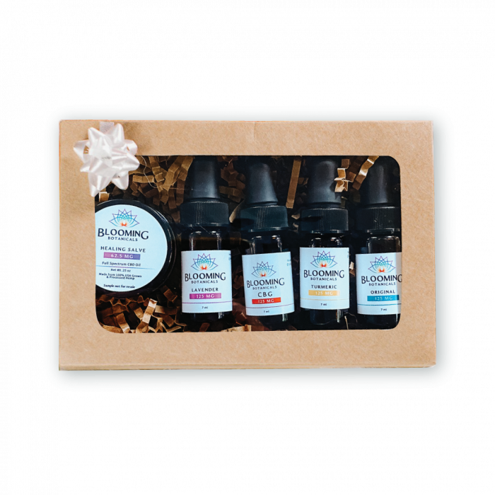 4 mini CBD tinctures including lavender, turmeric, original and CBG as well as 1 mini CBD healing salve in brown gift set box