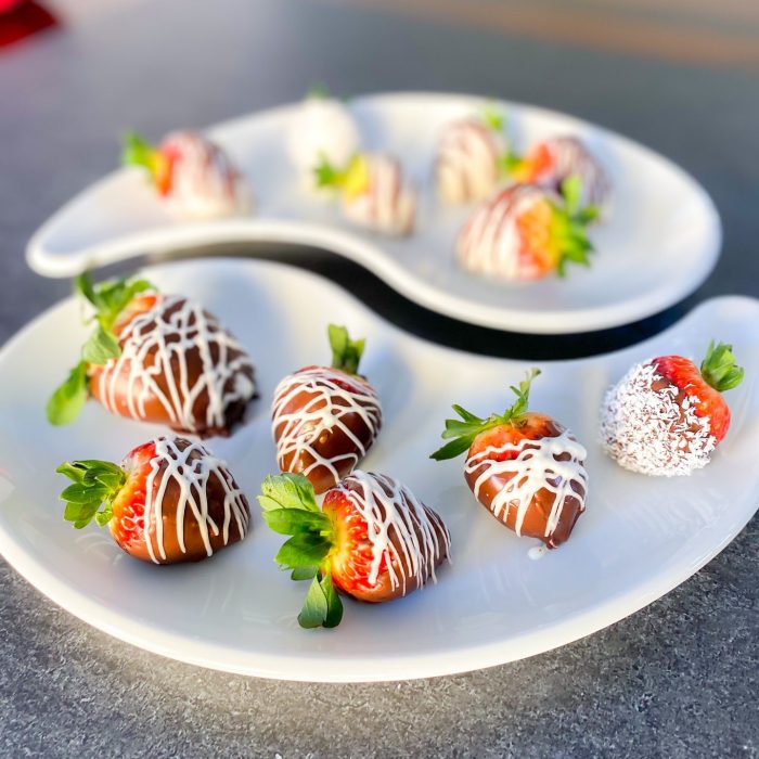 CBD Chocolate Covered Strawberries on White Ying Yang plates